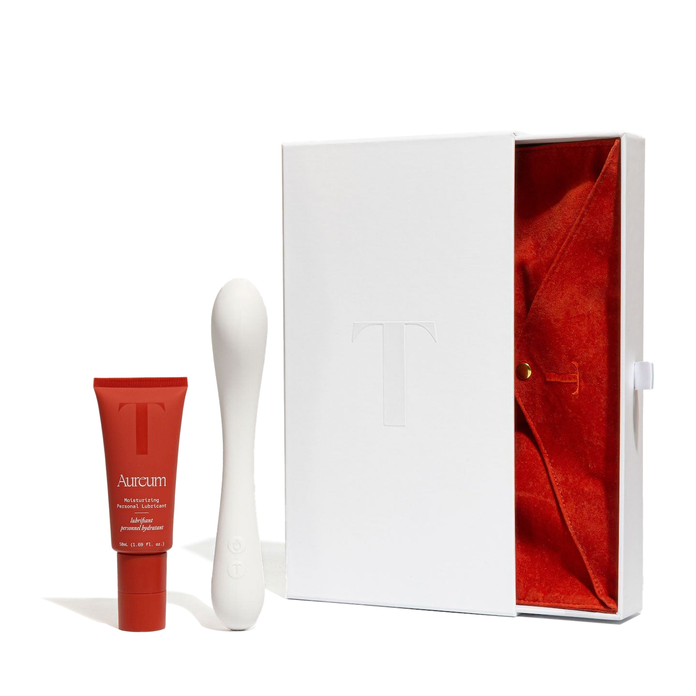 The Golden Hour Kit box and pouch next to the Nuri massager and Aureum personal lubricant